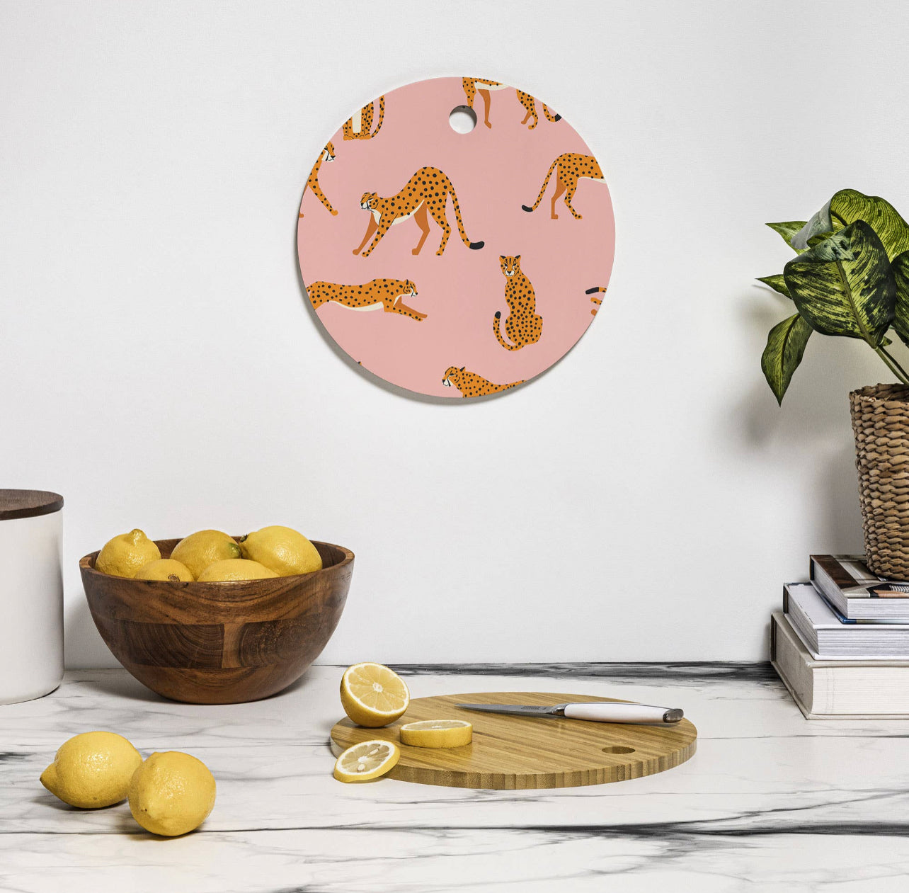 BlueLela Cheetahs Pink Round Cutting Board | Deny Designs