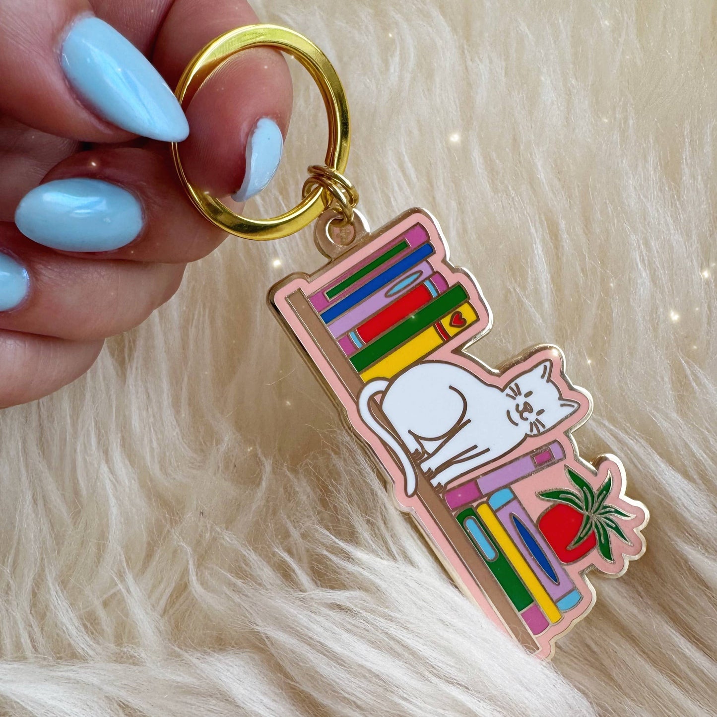 Cat Bookshelf Enamel Keychain: Packaged