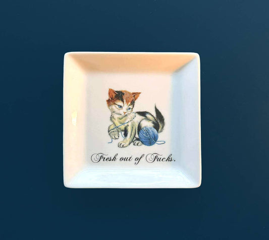 "FRESH OUT OF FUCKS." CAT TRINKET TRAY